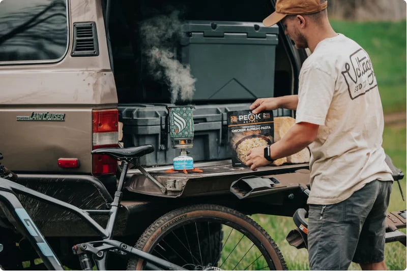 RTG Supply and Peak Refuel Preparing Meal on Truck Tailgate